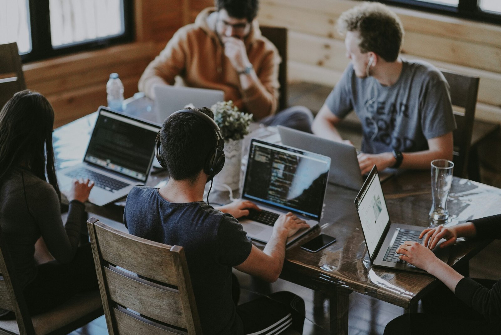 group of people using group of people using laptop computer
